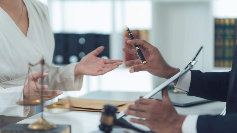 a couple of people that are sitting at a table